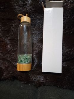 New glass crystal water bottle never used!