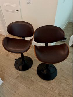 2 adjustable height and swivel bar stools