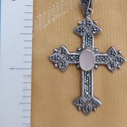 Silver with Marcasite and Mother of Pearl center Stone