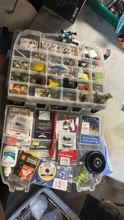 Fishing box pretty full from wet and dry for fly fishing atleast 100 flies & a few miscellaneous stuff trout lures , swivels, line litters, stringer,f