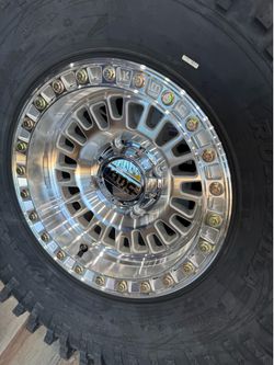 KMC WHEELS 15x8 with ROXXZILLA MAXXIS 35x10R15