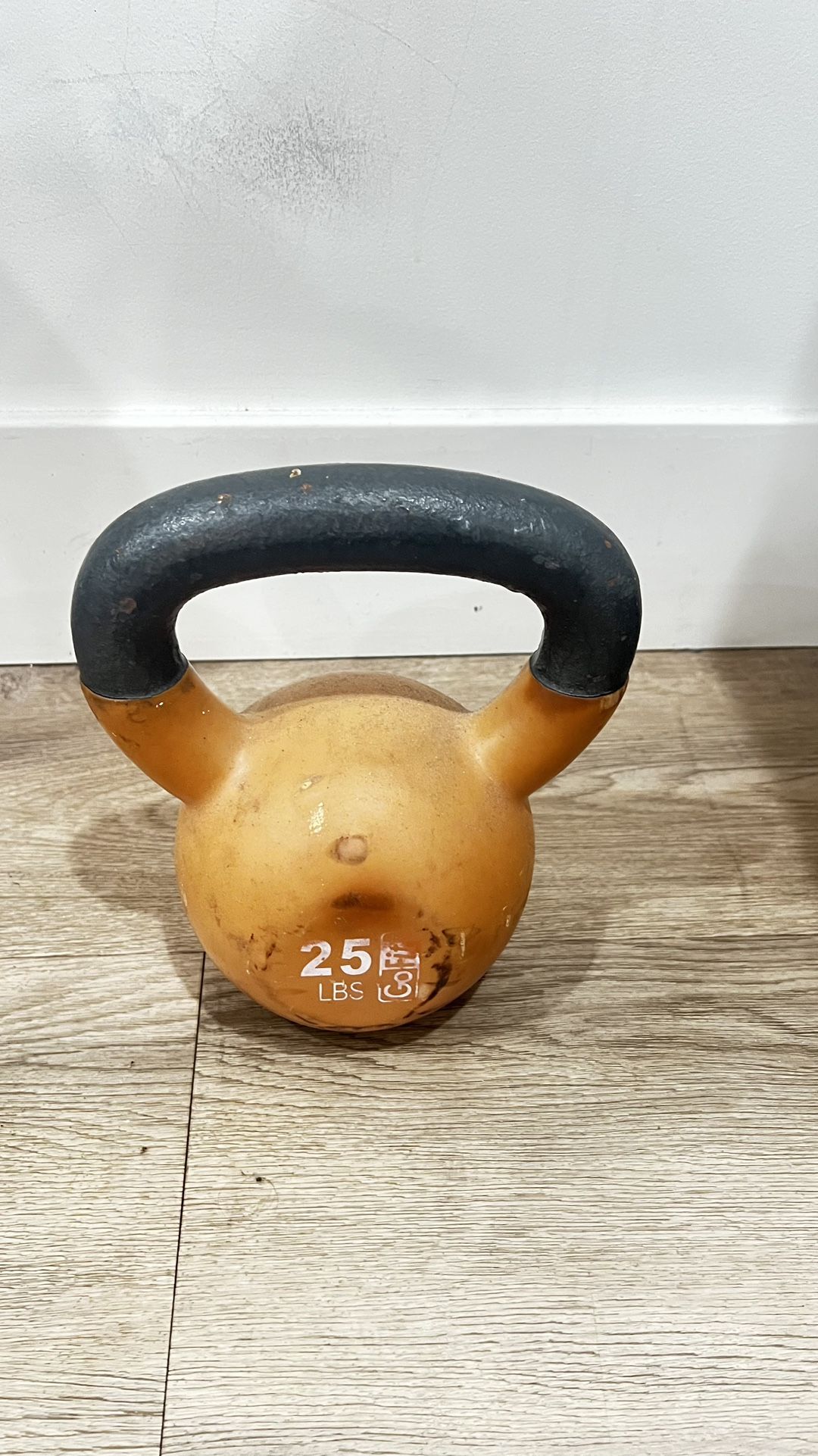 Two 35 Lbs And One 25 Lbs Kettlebell weights