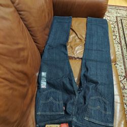 Two Pairs Of Stretch Levi Jeans. 