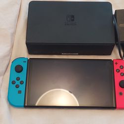 LIKE NEW NINTENDO SWITCH OLED RED BLUE + SUPER MARIO ODYSSEY + SUPER SMASH BROS ULTIMATE!!