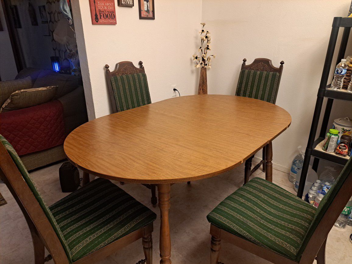 Oval Brown Dining Table With 4 Chairs
