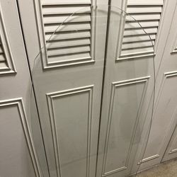 Large (46.5"L x 24.25"W), Heavy (approx 40 lbs.), Wave-Edge CLEAR GLASS TABLETOP - posted price is firm.