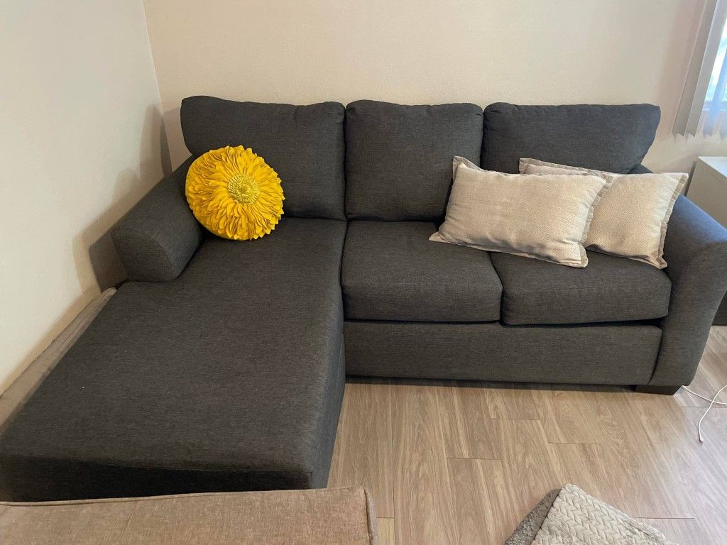 Beautiful Well-loved Sectional In Gray Fabric