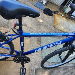 MOUNTAIN BIKE  26INCH  HUFFY  18SPEED SHIFTING AND BREAK VERY GOOD AND VERY GOOD  TIRES  EVERYTHING IS GOOD 