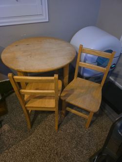 Kids all wood table and 2 chairs