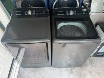Samsung black top-loading extra-capacity washer and dryer