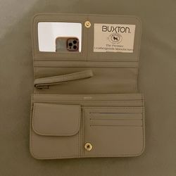 Buxton beige leather flap wristlet/wallet, brand new. Gold tone hardware.