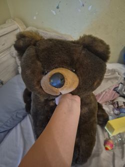Large vintage laying down bear