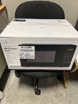 Mainstays 0.7 Cu ft Countertop Microwave Oven, 700 Watts, Black