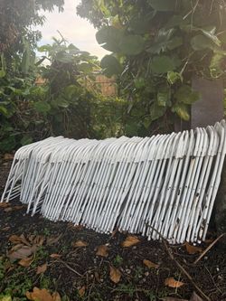 Used white folding chairs s,a,l,e