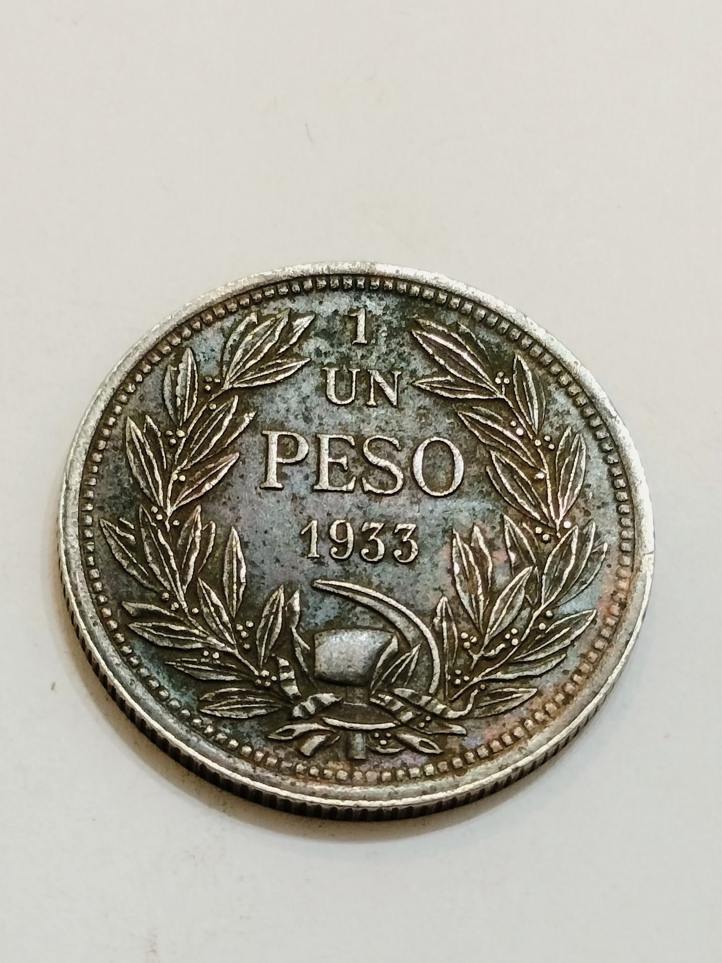 1933 Un Peso Antique Coin
