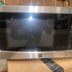 $120 Microwave USED 4 Times For $50.  First Come First Serve. MOVING SALE