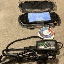 Sony PlayStation Portable PSP 1001 with case 