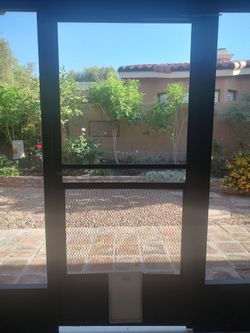 Precision Capri Bronze Steel Screen Door with Doggy Door – 36 5/8" x 79 1/2"