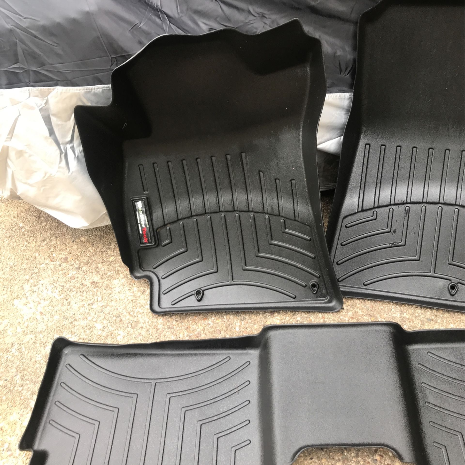 WeatherTech auto floor mats.