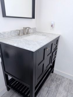 Black Bathroom Vanity with Marble Top and Sink