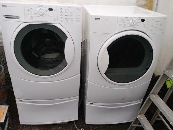 Kenmore Elite front loader washer and dryer he4t on pedistals w