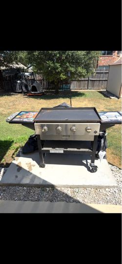 New never used Flat top stove outdoor 4 burner