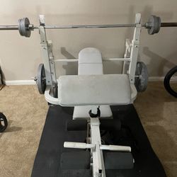 Weight Bench, Olympic Bar, And Weight