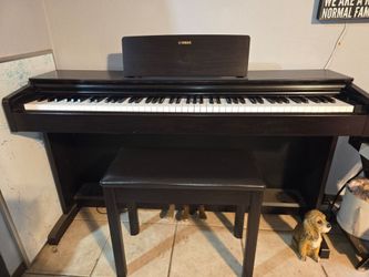 Yamaha piano ARIUS YDP-143