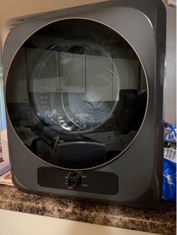 Portable washer and electric dryer set.