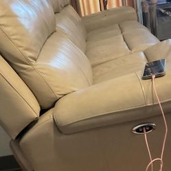 Cream Color leather  Couches Two 3 Seater And a One Seater