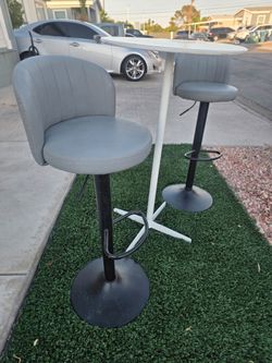 Bar stools and bar height table