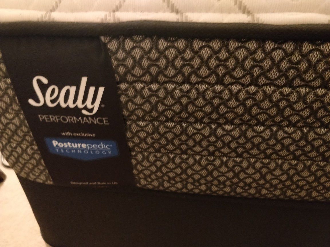 Less than a year old Sealy Posturepedic queen mattress + box spring + basic bed frame