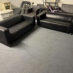 Set Of Matching Black Couches. 