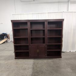 Sauder Dark Brown Three-Section Bookcase with Cabinet Doors