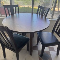 Walnut Round Dining Table With Chairs