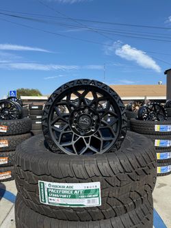NEW RIMS DWG MODEL H108 MATTE BLACK 17X9 OFFSET -12 6X139 WITH 4 NEW TIRES LT265/70/17 ROYAL BLACK AT