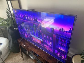 65” Smart Think Ai TV with Govee backlight system.