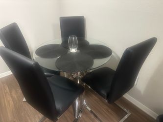 Glass dining table and 4 chairs set