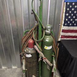 $599 portable oxy-acetylene welding and cutting torch kit with tanks and a rolling cart With Welding Helmet. OBO
