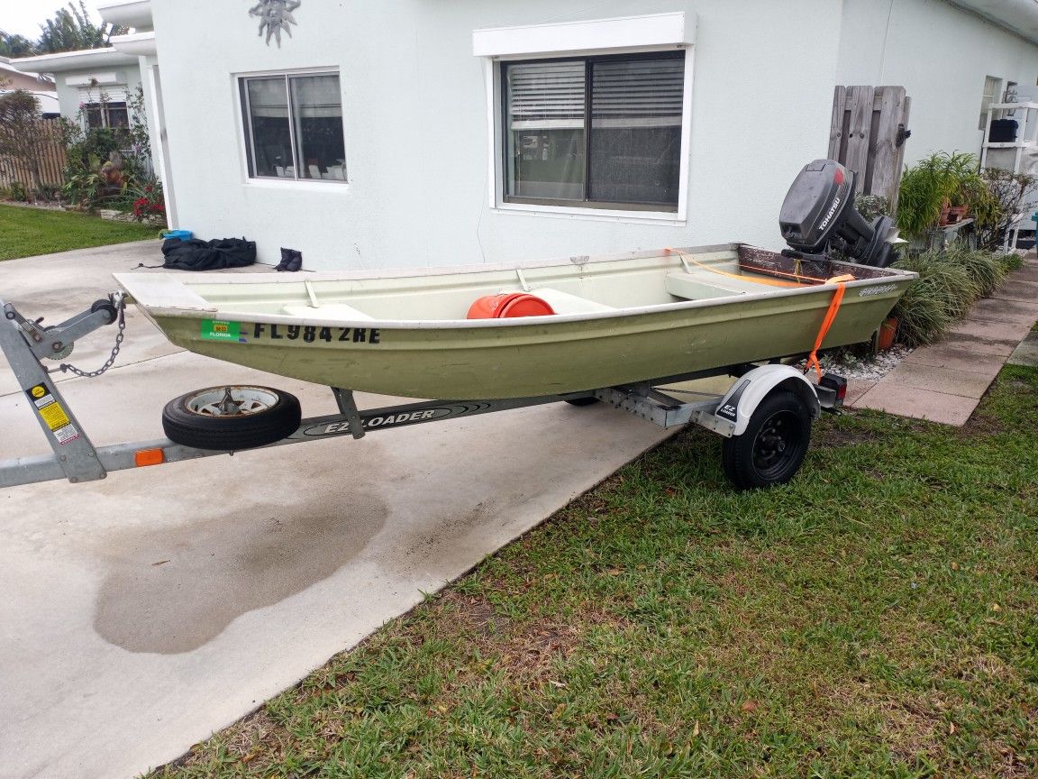 12 Ft Jon Boat With 18 Horsepower Nissan Tahatsu Motor And Trailer. Turn Key Ready
