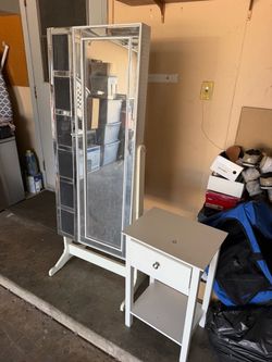 Jewelry armoire and small table