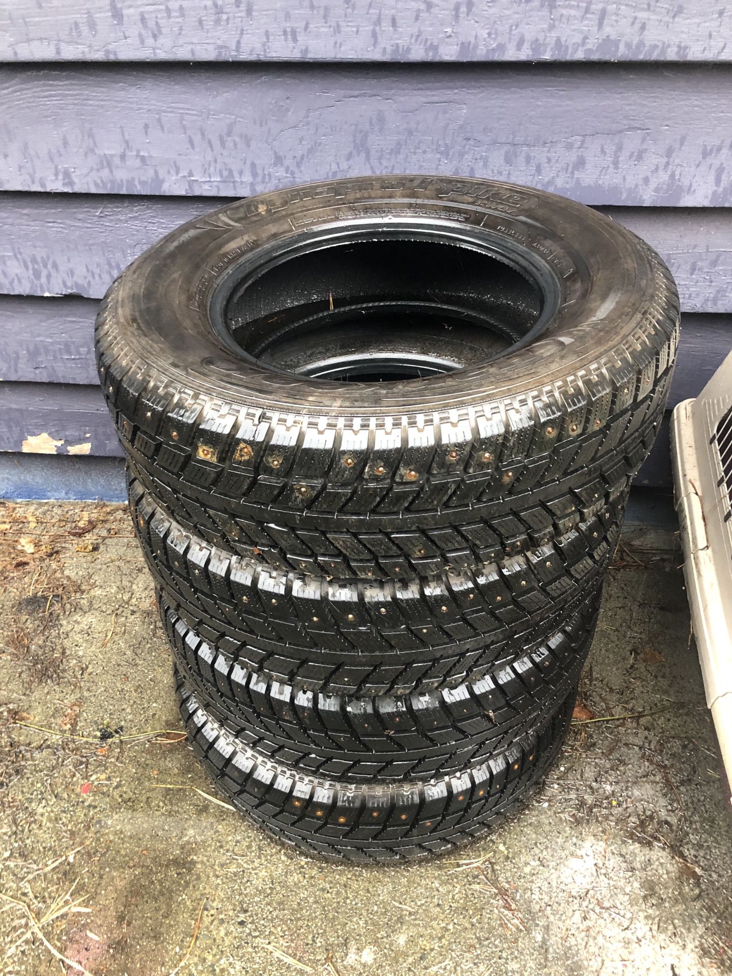 Pending pick up-Four free studded snow tires -west Seattle