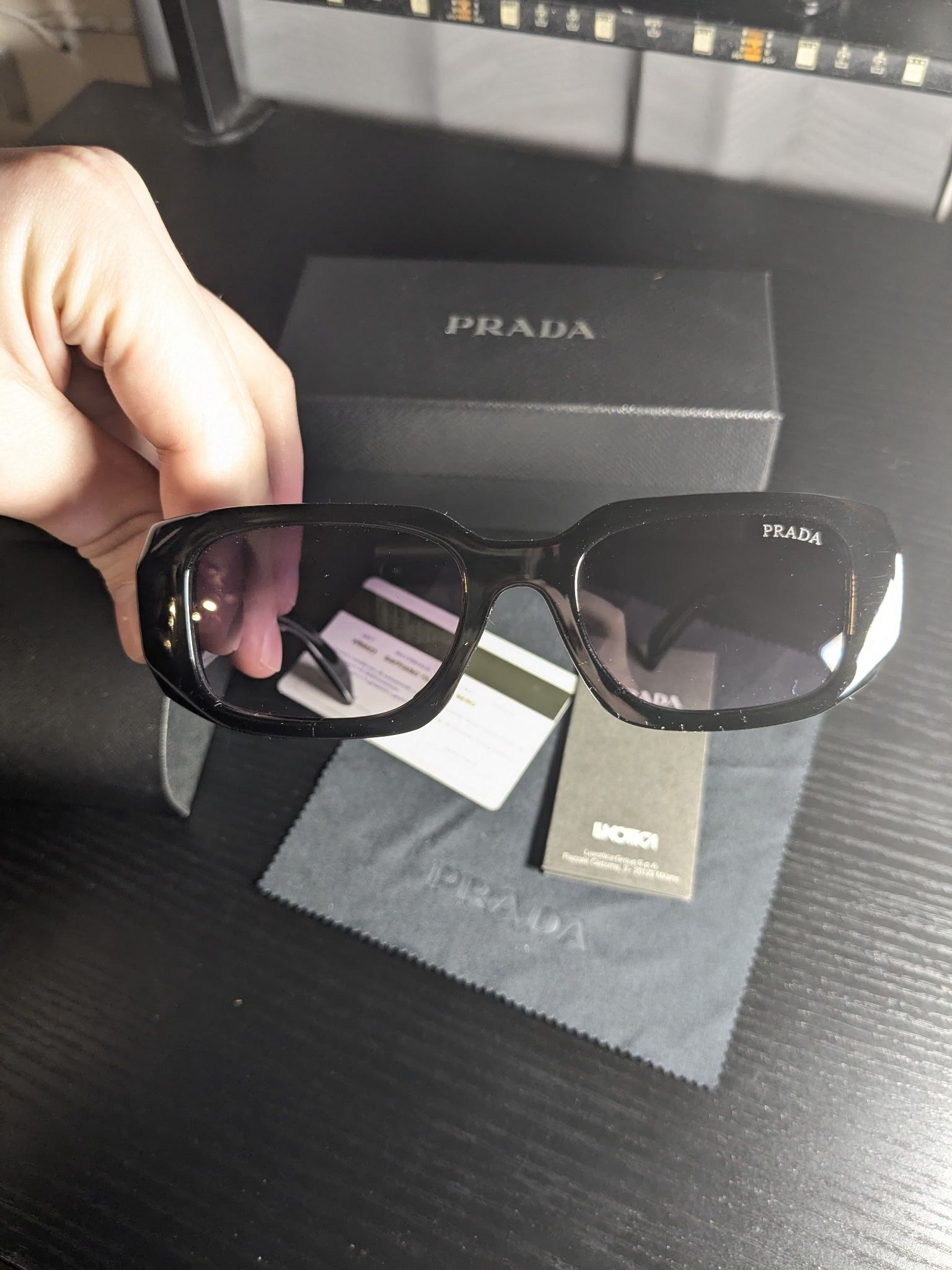 Black Prada Sunglasses With Purple Tint