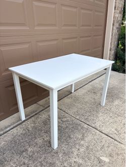 White clean rectangular dining table