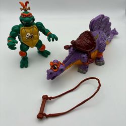 Vintage TMNT Cave Turtle Mike and Silly Stegosaurus Michaelangelo Dinosaur 1993