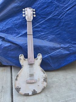 Rustic metal guitar decor
