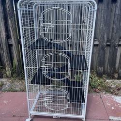 Metal Rolling Cage With 3 Doors 52”H X 25”W X17”D In Good Condition $80 Firm On Price
