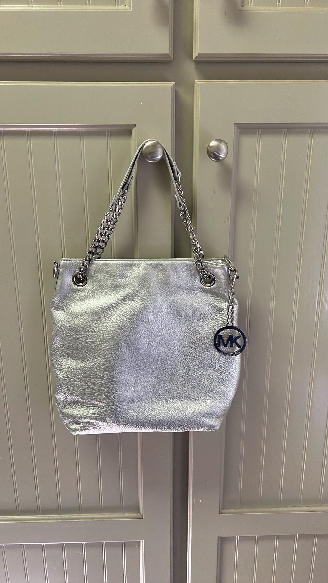 Michael Kors, Silver With A Silver Chain Handbag for Sale in Greenville ...