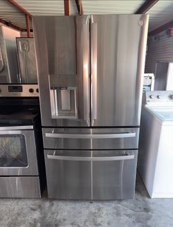 GE Stainless Steel Refrigerator And Freezer