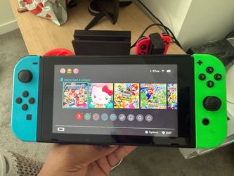SELL TODAY! Nintendo Switch with Neon Blue and Green Joy-Cons